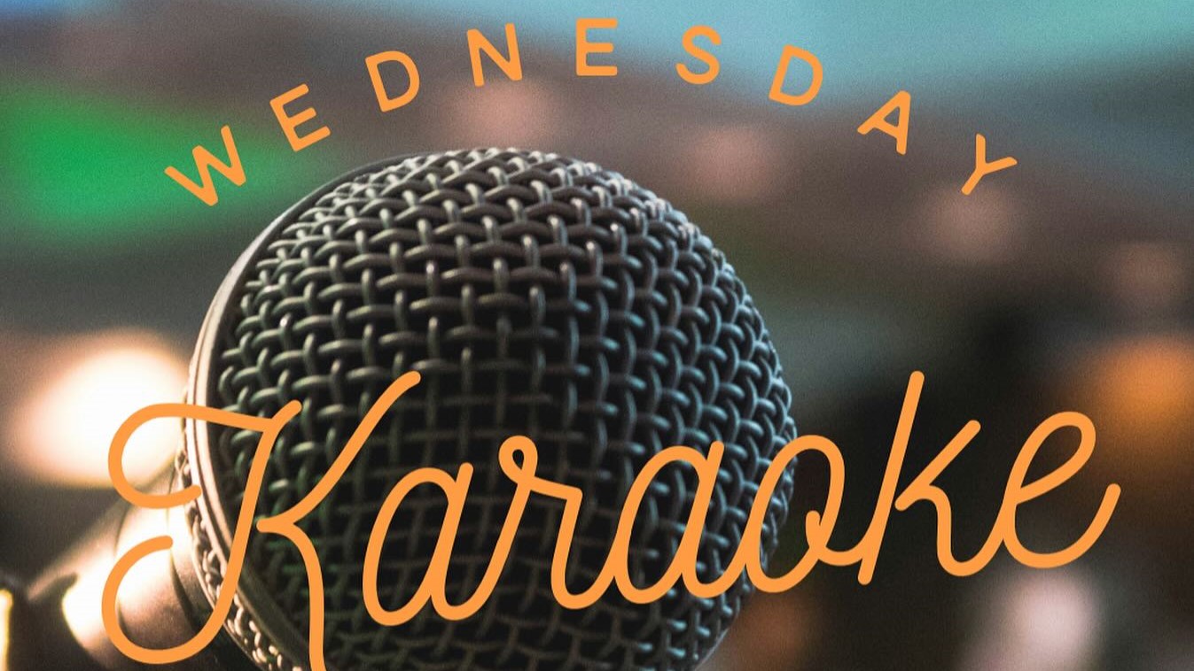 Close-up of microphone with “Wednesday Karaoke” text for event promotion